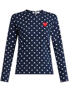 Simple yet effective, this long-sleeved T-shirt from Comme Des Garçons Play is enhanced by the addition of the appliquéd iconic red heart synonymous with the brand, which pleasantly contrasts the white polka dots against the blue background. This cotton T-shirt from Comme Des Garçons Play also features a crew neck and a straight hem. Long Sleeve Cotton T-shirt With Heart Print, Cotton T-shirt With Heart Print For Fall, Fall Cotton T-shirt With Heart Print, Fall Heart Print Cotton T-shirt, Dot Heart, Play Comme Des Garcons, Comme Des Garcons Play, Heart Logo, Simple Shirts