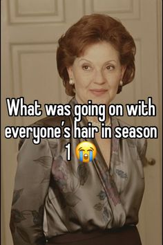 an older woman with red hair is smiling and has the caption what was going on with everyone's hair in season 1