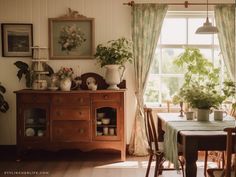 a dining room filled with lots of furniture and plants on top of a wooden table