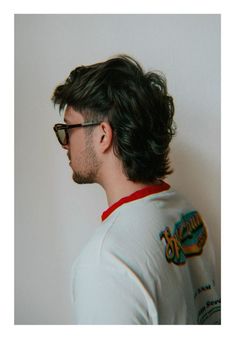 The Best 25 Modern Mullet Haircuts for Men (Detailed Gallery) | 25 Trendy Modern Mullet Haircuts for Men: The Ultimate Guide To New Mullet Hairstyles 80s Mens Mullet, Rock Mullet Men, Retro Mullet Men, Hảir Style Mullet, Modern Mullet With Straight Hair, Men’s Alt Mullet, Taper Mullet Haircut, Men’s Shag Mullet, Tapered Mullet Men Curly