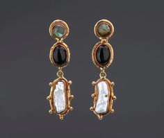 This pair of three-tier mixed stones (labradorite, black onyx, baroque pearl) earrings is a very decorative piece with contrasting colors and textures.  1. Stone shapes and sizes:    top : round labradorite button with a post : 10 mm stone copper bezel set in 14 mm brass base;     middle : oval black onyx button: 14 x 10 mm oval stone copper bezel set in 20 x 14 mm oval brass base.    bottom: a long, textured baroque pearl (23 x 8 mm) set inside a copper bezel on a studded brass base ( 30 x 17 m Elegant Pearl Drop Earrings With Natural Stones, Elegant Natural Stone Pearl Drop Earrings, Silver Pearl Earrings With Natural Stones, Exquisite Gemstone Pearl Earrings As Gift, Elegant Silver Pearl Earrings With Natural Stones, Exquisite Gemstone Pearl Earrings For Gift, Exquisite Pearl Earrings Gift, Exquisite Pearl Gemstone Earrings As Gift, Elegant Baroque Gemstone Jewelry