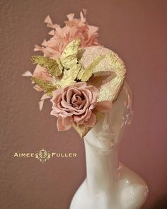 A dreamy color combination featuring gold-feather butterflies and pretty mauve rose. Luxurious brocade Jacquard fabric and a Heavenly feather array on this headband fascinator, perfect for race day or wedding.   Also appropriate for the Kentucky Derby, Kentucky Oaks, weddings, cocktail, high tea, church, holiday parties. and charity luncheons.  *FREE SHIPPING Handmade by Aimee Fuller in Southern California    For more STATEMENT JEWELRY and HANDMADE HATS go to www.aimeefuller.com FIND US ON FACEBOOK: https://www.facebook.com/aimeefullerdesigns/ Gold Costume Hats And Headpieces For Races In Spring, Gold Costume Hats And Headpieces For Spring Races, Gold Fascinator For Spring Garden Party, Gold Summer Fascinator For Garden Party, Gold Fascinator For Summer Garden Party, Gold Fascinator For Garden Party, Gold Headpiece For Spring Races, Gold Wedding Fascinator With Feathers, Adjustable Gold Mini Hats For Garden Party