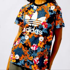 New With Tags Adidas Originals Floral Trefoil Very Oversized Rare Graphic Tee Shirt Size Xs But Will Easy Fit Up To A Large. Adidas Originals Logo, Floral T Shirt, Athletic Tops Women, Adidas Crop Top, Adidas Floral, Adidas Retro, Striped Shirt Women, Black Short Sleeve Shirt, Orange T Shirts