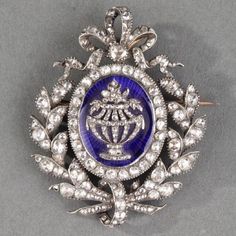 "Vintage Victorian Art 925 Silver 0.10 ctw. Natural diamond and 3.10 ctw. Rosecut  diamond blue enamel Brooch\" Metal: Sterling Silver Metal Purity: 925 Metal Wt:.18.92 Grams Diamond Type: Diamond  Diamond Color: Tinted Brown  Diamond Clarity: I1-I2  Diamond Cut: Good Diamond Shape: Rose cut  Diamond wt: 3.10 ctw. Additional material: blue enamel  Product Color: Oxidized Black and Gold Rhodium Plated on Sterling Silver" Blue Diamond Gemstone Brooches, Victorian Blue Jewelry With Diamond Accents, Exquisite Collectible Jewelry Brooch, Exquisite Collectible Brooch Jewelry, Blue Diamond Brooches For Anniversary, Formal Sapphire Diamond Brooches, Elegant Jewelry With Single Cut Diamonds And Enamel, Formal Sapphire Diamond Brooch, Antique Blue Diamond Jewelry