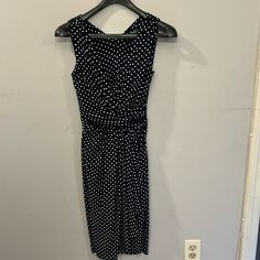 Nwot Lauren Ralph Lauren Sleeveless Polka Dot Dress In A Size 2. It Features A Classic Black And White Polka Dot Pattern, A Flattering Waistline With Gathered Details, And A Fitted, Knee-Length Silhouette. The Style Is Timeless And Versatile, Suitable For Both Casual And More Formal Occasions. Ralph Lauren Sleeveless Midi Dress, Casual V-neck Ralph Lauren Dress, Ralph Lauren Fitted Midi Dress, Fitted Sleeveless Polka Dot Midi Dress, Chic Black Ralph Lauren Dress, Ralph Lauren Women, Polka Dot Pattern, Black & White, Polka Dot Dress