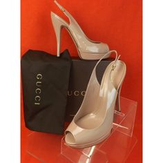 Beige Powder Patent Leather Lisbeth Peep Toe Slingback Platform Pumps Made In Italy 100% Authentic Size 40.5 Nothing Brings Italian Luxury To Mind Quite Like Gucci. Carry On The Tradition Of Superior Goods With Wares From The Legendary Italian Fashion House. Its Understandably Chic Appearance Would Surely Bring You Incredible Sumptuousness And Elegance. Covered Heel - 5 1/3" Platform - 3/4" Round Peep Toe Goldtone Buckle Adjustable Slingback Strap Leather Lining Leather Insole Leather Soles Colo Gucci Slingback Party Sandals, Gucci Slingback Sandals For Party, Gucci Ankle Strap Slingback Pumps For Spring, Spring Gucci High Heel Slingback Pumps, Gucci High Heel Slingback Pumps For Spring, Luxury Beige Slingback Pumps, Elegant Gucci Heels For Spring, Gucci Designer Slingback Sandals, Gucci Pointed Toe Evening Sandals