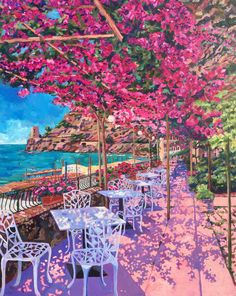 an oil painting of tables and chairs near the ocean with pink flowers on trees in bloom