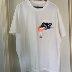 Nike Loose Fit Air Max Short Sleeved Tee Brand New Nike Cotton Crew Neck Shirt, Nike White Cotton Shirt, Nike Casual Short Sleeve Shirt, Nike Cotton Short Sleeve Shirt, Nike Cotton Shirt For Summer, Nike Cotton Summer Shirt, Nike Sporty Shirt For Spring, Nike Relaxed Fit Short Sleeve Shirt, Nike Short Sleeve Relaxed Fit Shirt