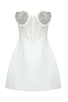 Details   Mini dress in innocent white with A-silhouette skirt. The dress features a boned mesh bodice, curved hemline and elastic back, ensuring a comfortable and form-fitting look. The padded cups are adorned with a hand-crafted heart-shaped crystal embellishment, adding a touch of glamour. The dress is fastened with a concealed side zipper closure and hook and eye, ensuring a seamless finish. Fully lined. Crafted to perfection for your special day, this dress radiates elegance and grace.   Si