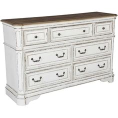 an old white dresser with drawers and wooden top