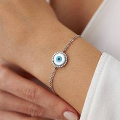 A lovely evil eye design in which the evil eye is accompanied by hand-selected natural diamonds. The double-chain design ensures the safety of the piece so that you can enjoy this piece for many years to come.★ Bracelet Features • Gold Kt: 14K/18K Solid Gold (According to your preference)• Available Gold Colors: Yellow Gold, White Gold, Rose Gold• Total Diamond weight: 0.20 carat• Diamond color: G color VS2/SI1 clarity• We only work with real natural diamonds• We include a signed certificate wit Diamond Stacking Rings Engagement, Diamond Evil Eye Bracelet, Evil Eye Design, Diamond Huggies, Diamond Evil Eye, Diamond Stacking Rings, Gold Colors, Gold Ring Stack, Diamond Chain