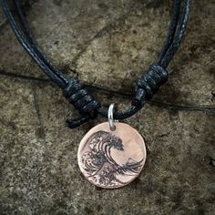 This copper necklace is a reinterpretation of the famous painting The Great Wave off Kanagawa by Hokusai. We have engraved this design into a hammered copper penny (or the larger english half penny copper coin) to make a rippled effect. The half penny is about the size of an American quarter. It's so beautiful! We engraved deeply into the metal so it will last forever. If you would like to have some engraving added to this design (for an extra charge) or something new all together then please me Penny Necklace, Mens Necklace Pendant, Hummingbird Pendant, Coin Art, Copper Penny, The Great Wave, Great Wave Off Kanagawa, Copper Coins, Copper Necklace