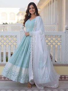 Introducing our stunning "fascinating sky-blue embroidered georgette function wear gown", a must-have addition to your ethnic wear collection. This exquisite gown features intricate sequin work and thread embroidery, adding a touch of glamour and elegance to your look. The sky-blue color is perfect for any festive occasion, event, or function, making you stand out in the crowd.
Made from high-quality georgette fabric, this fully stitched gown is available in sizes ranging from XS to XXL, ensurin डिजाइनर कपड़े, Blue Anarkali, Georgette Anarkali, Gown With Dupatta, Designer Gown, Bollywood Lehenga, Exquisite Gowns, Anarkali Gown, Party Kleidung