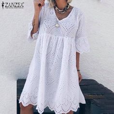 SPECIFICATIONS Women Bohemian Lace Crochet Dress Summer Sundress Flare Sleeve Hollow Out Casual Solid Cotton Linen Vestido Party Dresses Waistline: Natural Factors Style: Casual Sleeve Style: Flare Sleeve Sleeve Length(cm): Short Size Type: S M L XL XXL Silhouette: LOOSE Season: Summer Pattern Type: Solid Origin: Mainland China Neckline: V-Neck Model Number: Women Dress,Summer Dress Material: Cotton Dresses Length: Knee-Length Decoration: Lace Brand Name: ZANZEA White Casual Dress Outfit, Casual Dress Outfit, Floryday Vestidos, White Casual Dress, Lace Dress Casual, Crochet Midi Dress, Bright Sun, Harajuku Outfits, Casual White Dress