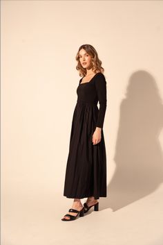 Expertly crafted for timeless elegance, the Galilea Dress in Black features a long sleeve and fitted top for a flattering silhouette. The square neckline adds a touch of sophistication while the full skirt and midi length offer versatile styling options for any occasion. Elevate your wardrobe with this must-have dress. The design process of Kleid is magic! Childhood best friends carefully review each detail to remain truthful to the reasons why they decided to embark in the adventure of reinvent Fall Black Dress With Straight Neckline, Black Fall Dress With Straight Neckline, Fall Maxi Dress With Fitted Bodice, Black Dress With Straight Neckline For Fall, Chic Black Maxi Dress With Square Neck, Black Square Neck Maxi Dress For Fall, Square Neck Midi Dress For Evening In Fall, Chic Fall Maxi Dress With Fitted Bodice, Square Neck Midi Dress For Formal Fall Occasion