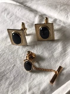 3 pc. Set from the mid 1960's stamped Hayward inside the cufflinks. Black onyx center stone set in a gold tone metal alloy. In good vintage condition. Feel free to convo me with any further questions. Thank you for your interest. Antique Cufflinks For Business, Classic Gold Cufflinks For Party, Vintage Picnic, Romantic Picnics, Music Box Jewelry, French Cuff, Providence Ri, Cuff Jewelry, Vintage Cufflinks