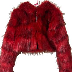 Red Fur Coat With Faux Fur Trim For Fall, Red Faux Fur Coat For Fall, Red Fur Coat For Fall, Red Faux Fur Outerwear For Fall, Red Faux Fur Long Sleeve Outerwear, Chic Red Fur Coat For Fall, Chic Red Faux Fur Outerwear, Red Long Sleeve Fur Coat For Fall, Shaggy Faux Fur Coat