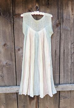 Gorgeous & unique pastel striped cotton Plisse maxi dress, 1970s vintage. Classic bohemian glam! Feautres an off-white crinkle cotton with pink & blue pastel striping, multicolored metallic thread detailing, a woven crochet neckline, a sweeping mid-calf length hemline with ribbon edging, a loose drape just right for twirling, and lots of statement hippie chic... Perfect as a costume or Period Piece, boho wedding gown, or statement festival wear with a tooled leather waist belt and strappy sandal Woven Crochet, Mesh Crochet, Bohemian Glam, Crochet Neckline, Period Piece, Crinkle Cotton, Retro Glam, Blue Pastel, Pastel Stripes