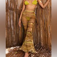 Oh Polly Flare Sheer Beach Trousers New Size S Olive Summer Beach Cover-up Bottoms For Vacation, Bohemian Bottoms For Beach Party In Summer, Bohemian Bottoms For Summer Beach Party, Bohemian Bottoms For Beach Party Season, Bohemian Bottoms For Beach Party, Tropical Wide Leg Vacation Bottoms, Bohemian Beach Party Bottoms, Tropical Beach Pants For Vacation, Trendy Summer Vacation Bottoms