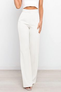 Introducing our Sophisticated High Waist Front Button Pants - the perfect addition to your wardrobe! These pants exude elegance and style with their high waist design and front button closure. Get ready to turn heads and feel confident in these stylish pants. 100% Polyester Model is 5"4 Brand Size Dress Bust Waist Hip XS 0-2 31-32.5'' 23-24'' 31-34" S 4--6 33-35'' 25-26'' 35-37" M 8--10 35-36'' 27-28'' 38-39" L 12--14 38-40'' 29-31'' 40-42" XL 14-16 40-42'' 33.5-36'' 44-46" 2XL 18-20 42-44'' 37-40'' 47-50" 3XL 22-24 44-46'' 41-46'' 51-55" 4XL 26-28 46-48'' 47-50'' 56-60" Chic Formal Dress Pants With Button Closure, Elegant Solid Color Party Bottoms, Elegant Workwear Pants With Button Closure, Chic Fitted Wide Leg Pants With Buttons, Elegant Office Pants With Button Closure, Elegant Dress Pants With Button Closure, Elegant Formal Pants With Buttons, Elegant Party Pants With Button Closure, Chic Wide Leg Dress Pants Solid Color