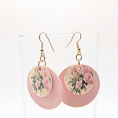 These pink paper earrings for women are lightweight and durable. They are coated to make them moisture-resistant and shiny. They consist of 2 circles. The larger one is 1.5 inches and the smaller one-inch one has pink roses on it. The price of these one of a kind earrings is $13.50 but the shipping is free if you purchase $35.These earrings would make a great gift for a friend or a gift for any woman. Thanks for stopping by SusanWillifordDesign. Handmade Pink Circle Earrings, Handmade Pink Circular Earrings, Pink Circle Earrings For Gift, Pink Circle Earrings For Gifts, Pink Circle Earrings As A Gift, Paper Earrings, Pink Paper, Houston Tx, Earrings For Women