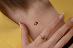 Our ladybug necklace is made of 14k solid gold and it is colored with enameled art. It has a dainty and cute style that everyone from 7 to 70 loves it!  When you consider our gold ladybug necklace as a gift, it will make your loved ones happy on their birthday, mother's day, valentine's day, anniversaries, graduation, or women's day. It will be a perfect gift! Our ladybug is ready to fly. 🐞 🎁 If you want, you can add a gift note for your loved ones. It arrives in a special jewelry gift box. ✨ Dainty Enamel Jewelry Gift, Dainty Enamel Necklace As A Gift, Dainty Handmade Enamel Jewelry, Handmade Dainty Enamel Jewelry, Delicate Enamel Jewelry For Gifts, Delicate Enamel Jewelry Gift, Minimalist Enamel Jewelry For Gifts, Minimalist Enamel Jewelry Gift, Ladybug Necklace