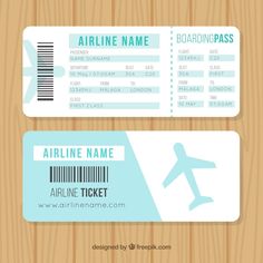 two airline tickets on wooden background