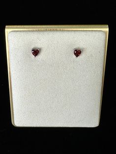 Embrace love and passion with our Heart Shape Garnet Earrings. Crafted in 925 Sterling Silver, each earring features a romantic heart-shaped garnet gemstone, symbolizing devotion and vitality. Perfect for expressing your affection or adding a touch of elegance to any outfit, these earrings are a timeless addition to your collection. Wear your heart on your ears - order now and let your love shine. ✨Why Choose Us: This crystal is unique and one-of-a-kind as it is carefully sourced, handpicked, and handled with the utmost care to ensure its beauty is preserved.  ✨Note: If anything happens to the crystal we are not responsible, as we make sure it is packed with care due to its delicate nature. Valentine's Day Formal Heart Gemstone Earrings, Ruby Earrings For Valentine's Day Anniversary, Ruby Earrings For Anniversary On Valentine's Day, Red Heart-shaped Earrings For Formal Occasion, Classic Heart Cut Earrings For Valentine's Day, Valentine's Day Heart Gemstone Earrings, Formal Heart-shaped Birthstone Earrings, Classic Valentine's Day Heart Cut Earrings, Heart Shaped Earrings For Valentine's Day Formal