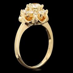 Splendid 1.15 Carats Natural Diamond 14K Solid Yellow Gold Ring Suggested Replacement Value: Approx. $4,200.00 Stamped: 14K Total Natural Round Cut Diamonds Weight: Approx. 1.15 Carats (color G-H / Clarity SI1-SI2) Center Diamond Weight is: Approx. 0.70ct (SI1 / I ) Item total weight: 4.8 grams Disclaimer: all weights, measurements and colors are approximate and may vary slightly from the listed dimensions or as seen in the image. All pictures are magnified to show the smallest of details. Pleas Elegant Yellow Gold Flower Ring With Prong Setting, Exquisite Yellow Gold Cluster Diamond Ring, Yellow Gold Diamond Flower Ring With Round Cut, Exquisite Formal Yellow Gold Cluster Ring, Exquisite Yellow Gold Cluster Ring For Formal Occasions, Heirloom Yellow Gold Cluster Ring With Halo, Luxury Wedding Flower Ring With Brilliant Cut, Luxury Wedding Flower Ring With Brilliant Cut Diamonds, Yellow Gold Flower Ring With Brilliant Cut Cubic Zirconia