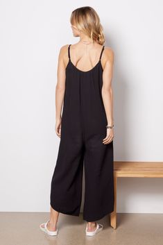 Looking chic is effortless with this Z Supply jumpsuit. Crafted in breezy gauze fabric with a flowy, relaxed fit, this versatile jumpsuit features side pockets, adjustable straps, and angled hems. Add a sun hat and slides for the perfect summer look. | Z SUPPLY Women's Flared Gauze Jumpsuit, Size XL, Black Solid Color Jumpsuits And Rompers For Summer Lounging, Solid Jumpsuits And Rompers For Summer Lounging, Chic Jumpsuits And Rompers For Summer Lounging, Beach Jumpsuits And Rompers With Adjustable Straps, Black Versatile Jumpsuits And Rompers For Summer, Versatile Black Jumpsuits And Rompers For Summer, Summer Relaxed Fit Jumpsuits And Rompers For Lounging, Black Lounging Jumpsuits And Rompers For Spring, Chic Jumpsuits And Rompers With Adjustable Straps For Vacation