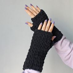 "Texting Gloves These chunky knit fingerless mittens; Made with chunky 100% hypoallergenic micro-polyester yarn, vegan friendly. The knitted wrist warmers are incredibly soft, fluffy and so nice to touch. These seamless knit fingerless gloves allow you to use your fingers freely while keeping your hands warm. You can use your phone, keyboard or hold your coffee mug comfortably. Match with infinity scarf of the same color: https://etsy.me/3r6mSRt Measuring approximately 7.8\" / 20 cm long, one size fits most.  Please note the sizes may differ very slightly due to the handmade nature of the item. This hand knitted winter accessory is a warm and stylish gift for women. * Machine washable at 30 degrees * Dry flat * Dry cleanable * Do not iron Your knit hand warmers will be packed with tissue p Knitted Wrist Warmer, Knit Fingerless Gloves, Glove Pattern, Gloves Fingerless, Gloves Fashion, Winter Mittens, Gloves Design, Crochet Fingerless Gloves, Crochet Mittens