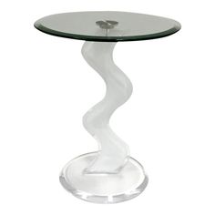 a glass table with a spiral design on it