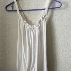 Gap Top. Ties At Bottom. Very Flattering. Brand New Never Worn. Gap Summer Cami Tank Top, Gap Sleeveless Summer Camisole, Gap Cami Tops For Summer, Chic Sleeveless Tops By Gap, Chic Sleeveless Gap Tops, Sleeveless Gap Tops For Daywear, Spring Gap Cami Tops, White Gap Tank Top For Spring, Gap Spring Cami Tops