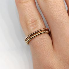 Everyone in our office wears one of these ball bands every. single. day. It's a classic and an absolute favorite. It's sure to compliment any combination of rings, from dainty to ka-pow! This setting is currently priced with solid 14k gold Adjustable Rose Gold Stackable Rings, Fine Jewelry Rose Gold Bands In 14k, Fine Jewelry 14k Rose Gold Bands, Fine Jewelry Rose Gold 14k Bands, Rose Gold Stackable Rings Tarnish Resistant, Classic Rose Gold Stackable Rings With Diamond Cut, Elegant Hypoallergenic Stackable Rings, Adjustable Rose Gold Bands In 14k Gold, Adjustable Rose Gold 14k Bands