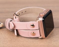 Recycled smart watch band for daily use. Get a gift for yourself, for them!  Compatibility  * For Apple Watch 38/40/42/44/45 mm * Series 9-8-7-6-5-4-3-2-1-SE  Hardware Colors  -Apple Watch- * Rose Gold * Gold * Black * Silver * Space Grey -Fitbit Versa 1, 2, Lite- * Rose Gold * Gold * Black * Silver  Sizes  * Fits wrists between: 155mm-200mm / 6"-7.80" !! Request extra holes if needed please !!  Personalization  * Have your band engraved!  Shipping  * North America / 1-3 business days * Europa / 1-3 business days * Asia Pacific / 3-5 business days Have a second thought? Please contact me :) Modern Pink Apple Watch Band For Gift, Modern Pink Apple Watch Band As Gift, Modern Pink Apple Watch Band Gift, Modern Pink Adjustable Watch Accessories, Modern Adjustable Apple Watch Band With Wrist Strap, Adjustable Modern Apple Watch Band With Wrist Strap, Adjustable Apple Watch Band For Everyday Use, Modern Pink Watch Bands For Gifts, Pink Modern Watch Bands For Gift