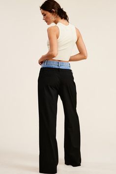 Introducing our one-of-a-kind Billie Trousers, where casual meets dressy in perfect harmony.These trouser pants are designed with a unique Peek-a-boo denim wash waistband that adds a playful twist to the sophisticated pinstripe pattern. Complete with functioning front pockets and belt loops on both the denim and pants, they seamlessly blend style and practicality. Fabric & fit: SELF: 69% POLYESTER 29% RAYON 2% SPANDEXCONTRAST: 100% COTTONModel is wearing size Small.