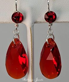 Swarovski Crystal Light Siam drop from a simple hook, for an elegant look These drop approximately 1 inch including the ear wire. Nickel-free Red Crystal Earrings, Red Nickel-free Crystal Earrings, Red Hypoallergenic Jewelry For Party, Red Hypoallergenic Party Jewelry, Hypoallergenic Red Jewelry For Parties, Red Drop Crystal Earrings As Gift, Red Hypoallergenic Jewelry For Formal Occasions, Hypoallergenic Red Jewelry For Formal Occasions, Formal Red Hypoallergenic Jewelry