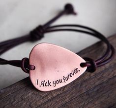 a bracelet that says i pick you forever on it with a heart tag attached to it