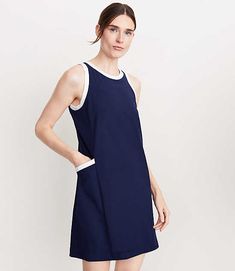 Ingeniously designed with a hidden shelf bra and polished tipping, this airy, breathable and seriously versatile shift dress is a total have-to-have. Crew neck. Sleeveless. Slash pockets.,Imported:Imported,Fit:Fit: Shift - fits straight and relaxed,Length:33" from center back neck to hem, measured from a size S,Fabrication:Shell 86% Polyester 14% Spandex, Lining 82% Polyester 18% Spandex,Garment Care:Machine Washable Lou & Grey Tipped Wanderweave Mini Pocket Dress Size 2XS Deep Space Blue Women' Casual Sleeveless Dress With Contrast Trim, Sporty Spring Dresses For Daywear, Fitted Summer Dress With Contrast Trim, Sleeveless Dresses With Contrast Trim For Spring, Casual Summer Dresses With Contrast Trim, Hidden Shelf, Grey Outfit, Petite Pants, Midi Maxi Dress