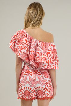 The Juny Floral Charmer One Shoulder Ruffle Top is calling your name! A tropical fun print highlights a single shoulder with exaggerated ruffle layers. The bodice maintains a cropped and voluminous fit with elastic casing along the bottom edge. Wear it with pants, sandals and your sunnies for a complete look! - Cropped- Ruffle layers- Elastic casing - One shoulder- Color: White RedSize + Fit - Model is 5'8" and wearing size XS- Measurements taken from size S - Chest: 35" - Length: 18" Fabric Sel Spring Floral Print One Shoulder Top, Summer Off-shoulder Top With Ruffle Hem, Off-shoulder Top With Ruffle Hem For Summer, Off-shoulder Tops With Ruffle Hem For Summer, Off-shoulder Ruffled Top For Beach, One Shoulder Floral Print Summer Tops, Summer One Shoulder Top For Vacation, One-shoulder Floral Print Summer Tops, Off-shoulder Ruffled Tops For Vacation