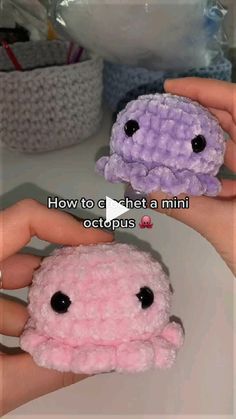 someone is holding two small stuffed animals in their hands with the caption how to crochet a mini octopus