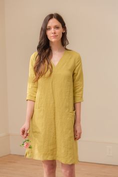 "DETAILS: - 100% linen dress - 3/4 sleeves, - v-neck - pockets - side slits LENGTH from highest shoulder point is 37\" / 94cm (based on size medium). FIT is relaxed but not oversized. Available ready to ship in select sizes and colors - https://www.etsy.com/listing/747512028/ready-to-ship-linen-v-neck-linen-shift FABRIC: - The mid weight linen is 5.3oz / 150g. It is very soft and has a a nice linen texture with the little imperfections that make linen so lovely. - All of our linen is OEKO-TEX St Linen Dress Pattern, Easter Dresses For Toddlers, Linen Design, Shift Dress Pattern, Dresses By Pattern, Linen Shift Dress, Yellow Style, Linen Shirt Dress, Vintage Material