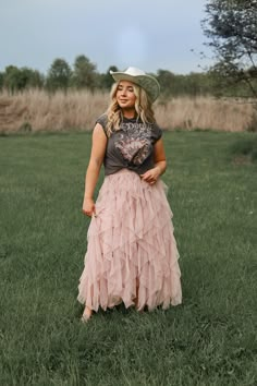 "Dusky Pink colored midi skirt with voluminous shift material, layered ruffle details, a high waist elastic band, and a tiered silhouette that falls into a full mid-calf cascade.    - High waist  - Gully Lined - Special occasion  - A-line silhouette  - Dusky Pink Waist: S 24\"  M 26\" L \"30\" * MORE TO LOVE   shop gallop and find apparal for a wedding rehearsal formal evening party anniversary skirt southern glam boho gala midi special occasion vintage retro skirt" Carrie Bradshaw Outfits Plus Size, Western Cowgirl Party Ideas, Wedding Guest Country Outfit, Southern Woman Style, Country Cute Outfits, Boho Themed Party Outfit, Cowgirl Outfits Skirt, Country Wedding Outfits For Women Guest, Western Gala Outfit