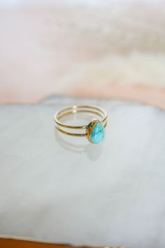 This dainty, pear shaped turquoise ring with a double band is the perfect simple, everyday design. Love it for its minimalistic style but with a pop of color! Please Note Turquoise is a natural stone and varies in color from blue to green and many shades in between. Some have matrix markings and some do not, each stone is different and unique. The stone you receive WILL vary from the photos listed. The photos are a representation of my stones, it DOES NOT mean it is the exact stone you will rece Turquoise Wedding Rings, Teal Jewelry, Turquoise Stone Jewelry, Western Rings, Turquoise Gold Ring, Natural Turquoise Stone, Gold Vermeil Jewelry, Ring Turquoise, Vermeil Jewelry