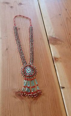 Beaded fringe necklace aqua blue red seeds 29 inch hand made Fringe is 6 inches Beautiful design with bugle beads, seed beads, and actual seeds Stunning! Traditional Red Beads With Bead Caps, Red Bohemian Beaded Fringe Jewelry, Red Bohemian Jewelry With Beaded Fringe, Red Artisan Beaded Necklaces For Crafting, Artisan Red Beaded Necklaces For Crafting, Traditional Red Beaded Fringe Jewelry, Artisan Red Beaded Necklace With Dangling Beads, Southwestern Red Beaded Necklace, Southwestern Style Red Beaded Necklace