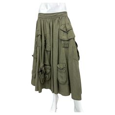 S/S 2003 Dolce & Gabbana midi skirt with big cargo pockets. Military inspired design. Composition: linen, made in Italy Conditions: great, no significant flaws Size: missing size tag Waist: 40cm / 15,7inches Total length: 75cm / 29,5inches Khaki Knee-length Skirt With Pockets, Summer Khaki Cargo Skirt With Side Pockets, Summer Tiered Cargo Skirt With Pockets, Tiered Cargo Skirt With Pockets For Summer, Bohemian Knee-length Bottoms With Pockets, Green Tiered Skirt With Pockets, Baggy Skirt With Pockets, Utility Skirt With Pockets In Khaki, Knee-length Utility Cargo Skirt With Pockets