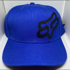 Cap With Fox Logo Adjustable Blue Flat Bill Baseball Cap For Spring, Blue Casual Sports Hat, Casual Blue Sports Hat, Blue Snapback Hat With Flat Brim For Spring, Blue Flat Brim Snapback Hat For Spring, Blue Flat-brim Snapback Hat For Spring, Casual Blue Adjustable Snapback Hat, Casual Blue Snapback Hat, Casual Blue Flat Brim Baseball Cap