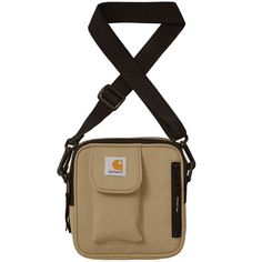 Product Features     One size: 17 x 16.5 x 6 cm / 6.7 x 6.5 x 2.4 inch   1.7 liters   97% polyester (recycled), 3% polyurethane   Water-repellent   Adjustable shoulder strap   Square Label   Style - I013470-2FS    Brand Restrictions At Stuarts     Stylist Notes   Crafted from a sustainable recycled polyester-blend canvas, the small Essentials Bag offers a stylish and water-repellent design. This eco-friendly bag is fully lined, providing durability and protection for your belongings. It features two main compartments, each secured with a two-way zip closure for easy access. Additional functional details include a Velcro pouch and a small zipped front pocket, perfect for keeping smaller items safe and organised. Whether for daily use or travel, this compact bag combines practicality with ec Carhartt Wip Essentials Bag, Randolph Sunglasses, Carhartt Work In Progress, Eco Friendly Bags, Protective Clothing, Carhartt Mens, Essential Bag, Water Repellent Fabric