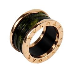 Inspired by the grandeur of Rome’s Colosseum, this ring celebrates eternity and modernity thanks to bold lines and pure design. Combining a beautiful green Marble spiral and two 18k Rose Gold loops is a concrete statement of Italian elegance. ​​​​​​​ Size: EU 53 SKU: BVL01190 Luxury Polished Emerald Ring, Luxury Rings With Polished Finish, Luxury White Gold Emerald Ring With Polished Finish, Luxury Emerald Ring In White Gold With Polished Finish, Luxury Emerald Anniversary Ring, Luxury Green Emerald Ring With Polished Finish, Luxury Green Jewelry With Polished Finish, Luxury Yellow Gold Emerald Ring With Polished Finish, Luxury Rose Gold Emerald Ring For Formal Occasions