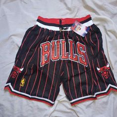 Chicago Bulls Shorts Black Strip - Basketball Shorts Store Basketball Team Spirit Shorts For Sports Season, Basketball Team Spirit Shorts, Casual Athletic Shorts With Built-in Shorts For Basketball, Casual Team-colored Basketball Shorts, Casual Basketball Shorts In Team Colors, Team-colored Basketball Shorts, Casual Team-colored Athletic Shorts For Basketball, Team Spirit Athletic Shorts For Summer, Collegiate Style Basketball Shorts